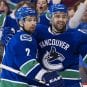 chris-higgins-dan-hamhuis-vancouver-canucks-april2011