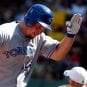 Travis Snider of the Toronto Blue Jays lifts his hand in a game in July 2012.