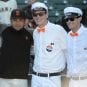 San Francisco Giants outfielder Melky Cabrera poses with members of his "Melk Men" fan club in 2012.