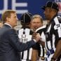 NFL Commissioner Roger Goodell shakes hands with referee Chad Brown at the 2011 Super Bowl.