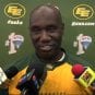 Edmonton Eskimos head coach Kavis Reed is shown speaking to the press.