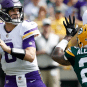 Vikings quarterback Kirk Cousins plays against the Packers