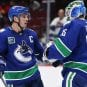 Bo Horvat and Thatcher Demko of the Vancouver Canucks
